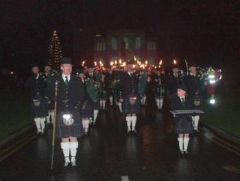 Northern Constabulary Pipe Band lead St Andrew’s Day torchlight procession, Inverness