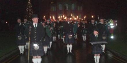 Northern Constabulary Pipe Band lead St Andrew’s Day torchlight procession, Inverness